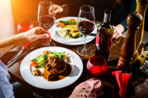 Couple Having Romantic Dinner in sunny restaurants in independence