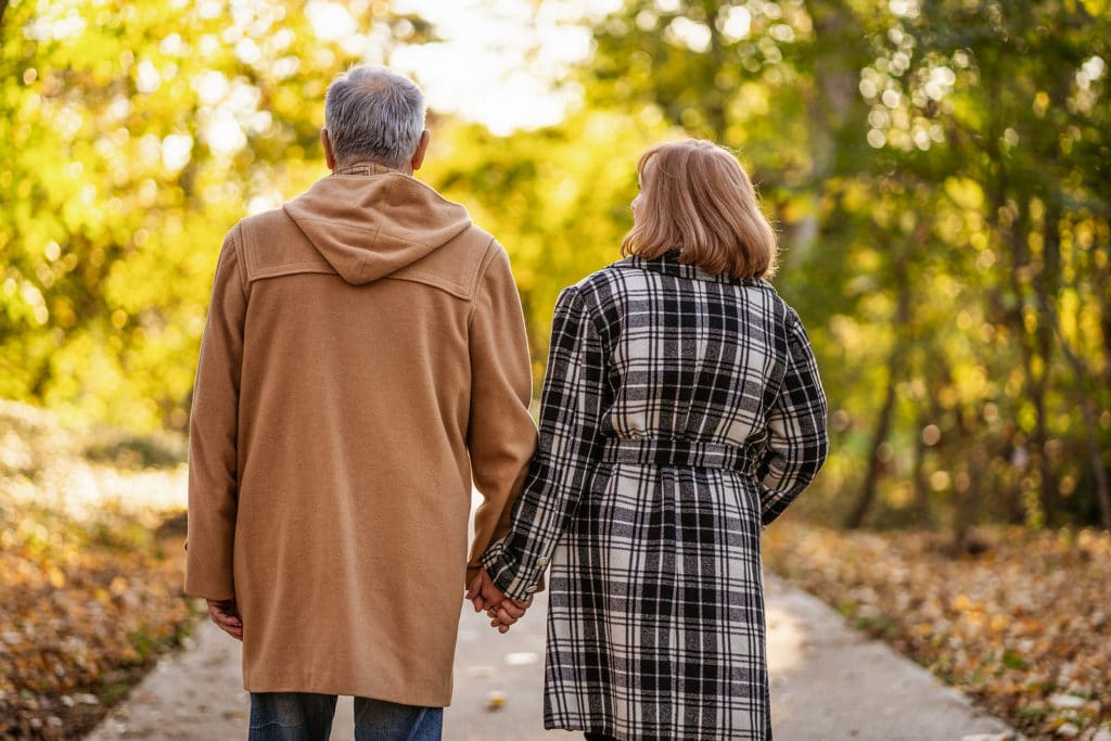 Couple enjoying top attractions like the Truman Library and a relaxing romantic getaway in Missouri this fall 